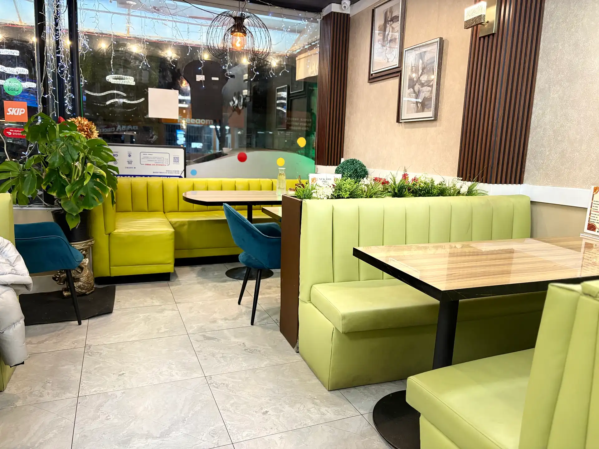 Baba Chicken lime green L-shaped booth seating Vancouver BC